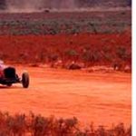 start of the 1925 50-mile championship race with Colliver’s Chrysler, Poole’s Bugatti, Cranston’s Ford and Smith’s Buick; Ron West in his Brax Dodge at the 2014 Centenary; Wizard Smith’s team; motorcycle ace Sprouts Elder drifts in style, 1928